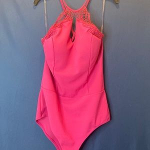 Bright pink bodysuit